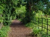1.3 km After the end of the tarmac, the second part of the bridleway between Cleeve and The Leatherne Bottel is currently well-maintained, with most of the sidegrowth cut back and mud kept at bay with  a coating of wood-chips.