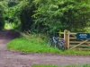 7.3 km Further on, The Ridgeway crosses the golf course between two hedges, planted when the golf course was developed some years ago. The bridleway has an earth surface. in good condition, so is obviously not much used by horse riders. There are warnings not to enter the golf course.