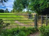 10.10 km Just before Crowmarsh, the bridleway is rejoined by the footpath from Newnham Farm, which is just visible in the centre of this photo taken looking south. Upgrading this footpath to a bridleway is the preferred alignment for the GWR.
